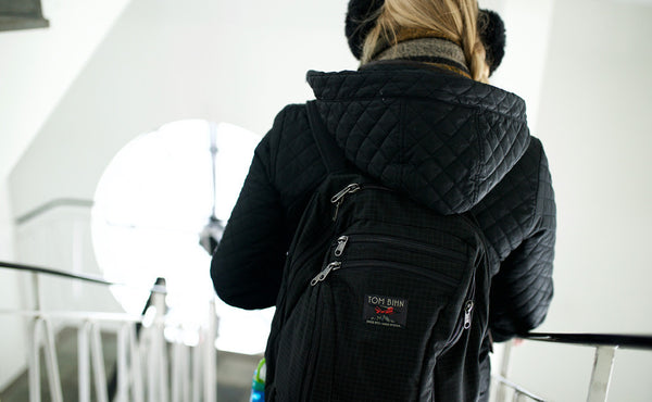 A person descending a flight of stairs with the Synapse 25.